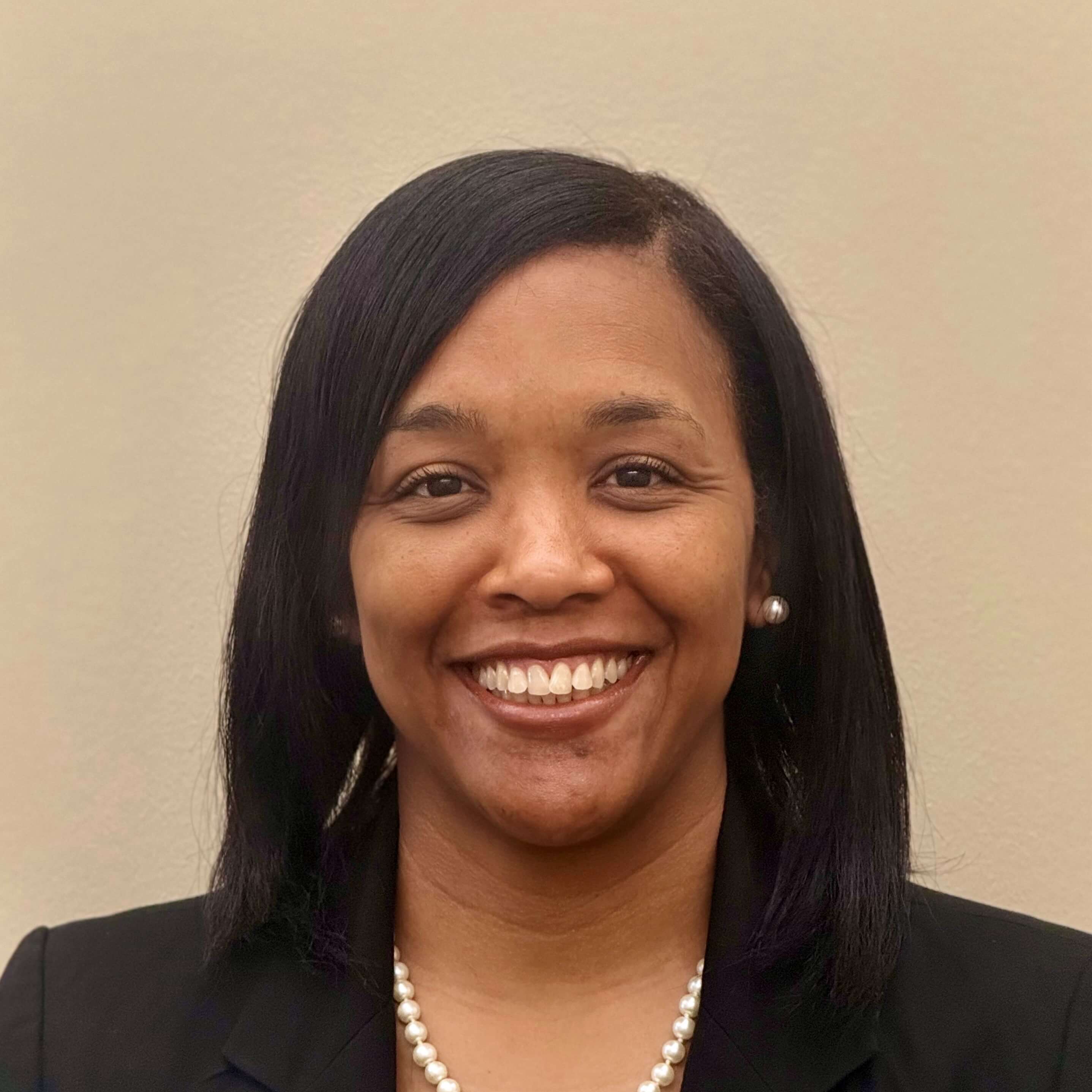 Headshot of Dekaya Fontenot.