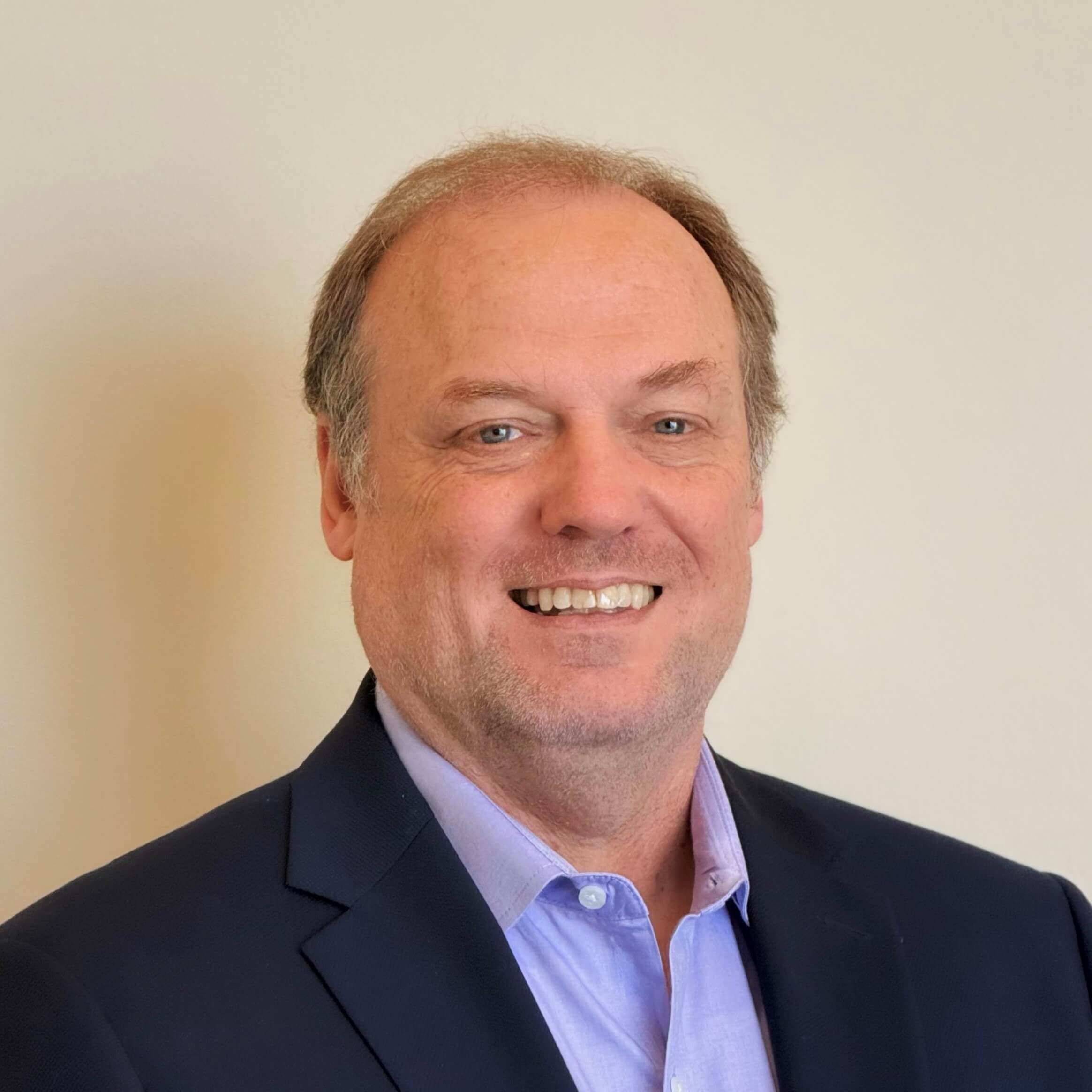 Headshot of Michael Riley.