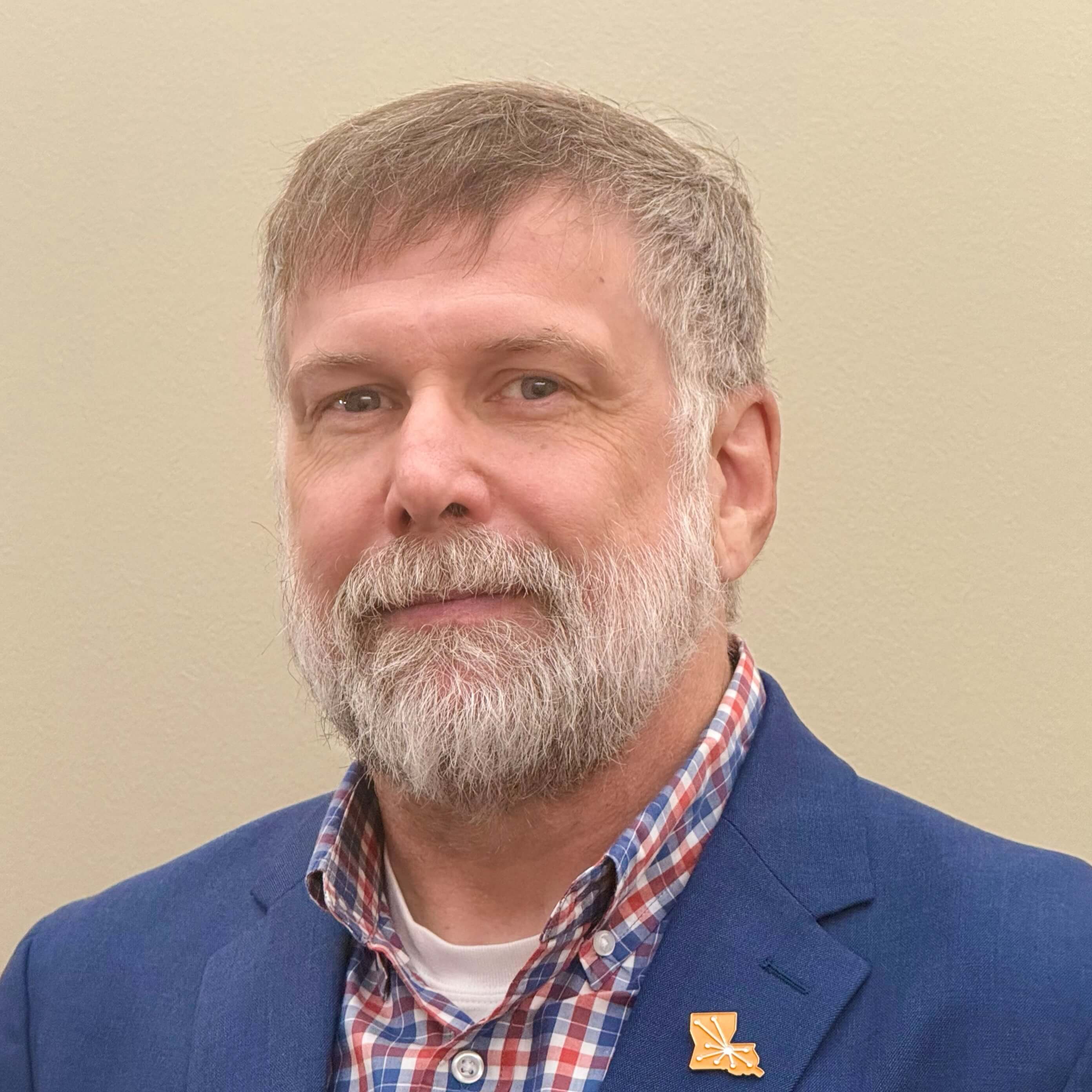 Headshot of Tom Allsup.